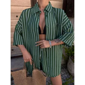Summer suit: off-shoulder shirt and shorts. Green